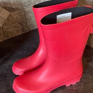 A new day. Red rain boots.